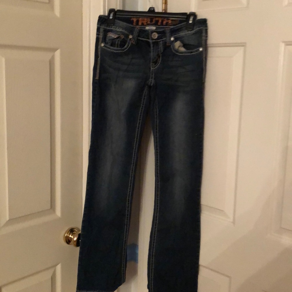 Truth jeans with Decorations on back pocket